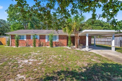 Discover an incredible opportunity to own a 4-bedroom brick home on Tiger Point Golf and Country Club in Florida - for sale on GolfHomes.com, golf home, golf lot