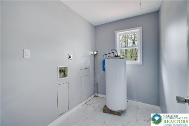 WOW! With the marble floors and beautifully done kitchen and on Pocono Farms Country Club in Pennsylvania - for sale on GolfHomes.com, golf home, golf lot