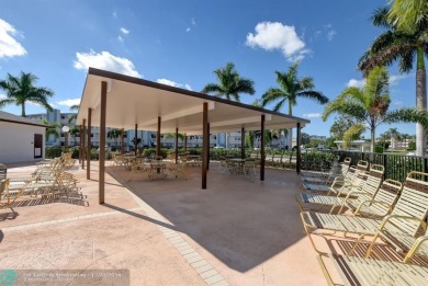 This 2 bedroom, 1.5 bath unit boasts lake and garden views in a on Southwinds Golf Course in Florida - for sale on GolfHomes.com, golf home, golf lot