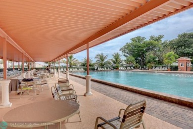 This 2 bedroom, 1.5 bath unit boasts lake and garden views in a on Southwinds Golf Course in Florida - for sale on GolfHomes.com, golf home, golf lot