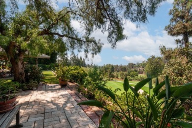 Step inside to find two expansive living areas, a large kitchen on Friendly Hills Country Club in California - for sale on GolfHomes.com, golf home, golf lot
