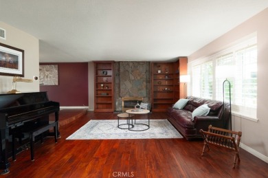 Step inside to find two expansive living areas, a large kitchen on Friendly Hills Country Club in California - for sale on GolfHomes.com, golf home, golf lot