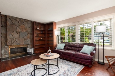 Step inside to find two expansive living areas, a large kitchen on Friendly Hills Country Club in California - for sale on GolfHomes.com, golf home, golf lot