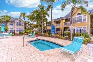 Overlooking the community POOL and HOT TUB, this condo offers on MetroWest Golf Club in Florida - for sale on GolfHomes.com, golf home, golf lot