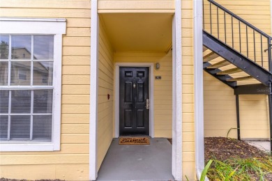 Overlooking the community POOL and HOT TUB, this condo offers on MetroWest Golf Club in Florida - for sale on GolfHomes.com, golf home, golf lot