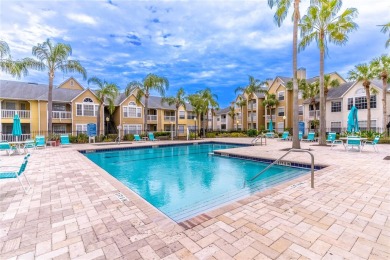 Overlooking the community POOL and HOT TUB, this condo offers on MetroWest Golf Club in Florida - for sale on GolfHomes.com, golf home, golf lot