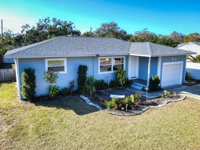 Location! Location! This fully remodeled 3 bedroom 2 bath home on The Dunedin Country Club in Florida - for sale on GolfHomes.com, golf home, golf lot