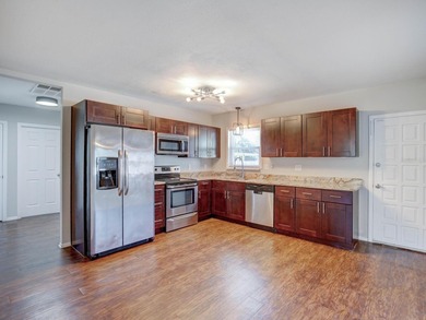 Location! Location! This fully remodeled 3 bedroom 2 bath home on The Dunedin Country Club in Florida - for sale on GolfHomes.com, golf home, golf lot