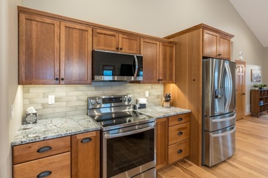 RARE BLACK HILLS GEM! Nearly new, fully-furnished custom home in on Boulder Canyon Country Club in South Dakota - for sale on GolfHomes.com, golf home, golf lot