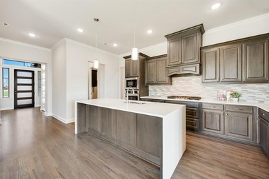 This popular single story Altura Birch floorplan is now on Heath Golf and Yacht Club in Texas - for sale on GolfHomes.com, golf home, golf lot