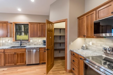 RARE BLACK HILLS GEM! Nearly new, fully-furnished custom home in on Boulder Canyon Country Club in South Dakota - for sale on GolfHomes.com, golf home, golf lot