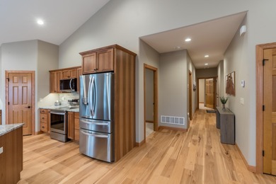 RARE BLACK HILLS GEM! Nearly new, fully-furnished custom home in on Boulder Canyon Country Club in South Dakota - for sale on GolfHomes.com, golf home, golf lot