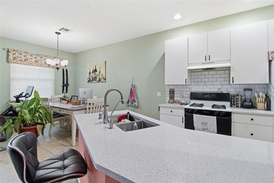 Welcome home to this beautiful three bedroom, two bathroom on Cypresswood Golf and Country Club in Florida - for sale on GolfHomes.com, golf home, golf lot