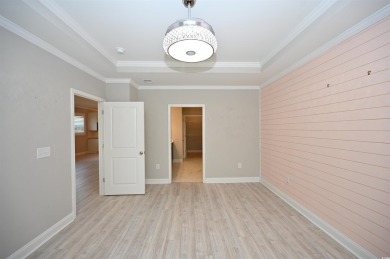 Welcome to this beautiful 2-bedroom, 2-bathroom home located in on Myrtlewood Golf Course and Club  in South Carolina - for sale on GolfHomes.com, golf home, golf lot