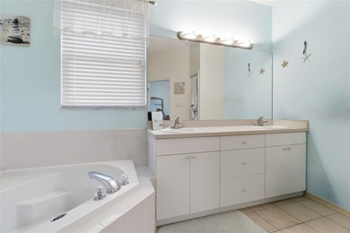 Welcome home to this beautiful three bedroom, two bathroom on Cypresswood Golf and Country Club in Florida - for sale on GolfHomes.com, golf home, golf lot