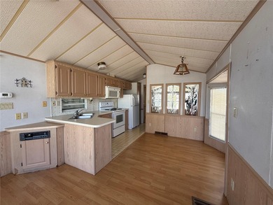 Snowbirds and homeowners welcome! Enjoy an active and vibrant on Glen Lakes Country Club in Florida - for sale on GolfHomes.com, golf home, golf lot