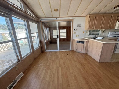 Snowbirds and homeowners welcome! Enjoy an active and vibrant on Glen Lakes Country Club in Florida - for sale on GolfHomes.com, golf home, golf lot