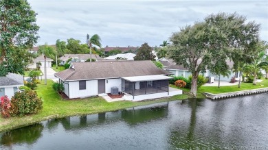 Country Club Living - Totally renovated 3/2 single family home on Miles Grant Country Club in Florida - for sale on GolfHomes.com, golf home, golf lot