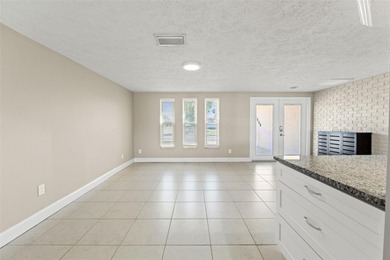 This beautifully updated Gulf Harbors waterfront home delivers on Gulf Harbors Golf Course in Florida - for sale on GolfHomes.com, golf home, golf lot