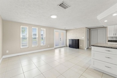 This beautifully updated Gulf Harbors waterfront home delivers on Gulf Harbors Golf Course in Florida - for sale on GolfHomes.com, golf home, golf lot