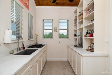 Located in SPI Golf Community, this Open-Concept Home features on South Padre Island Golf Club in Texas - for sale on GolfHomes.com, golf home, golf lot