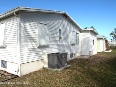 Brand New Roof To Be Installed On This 'Homes of Merit' Double on Barefoot Bay Golf Course in Florida - for sale on GolfHomes.com, golf home, golf lot