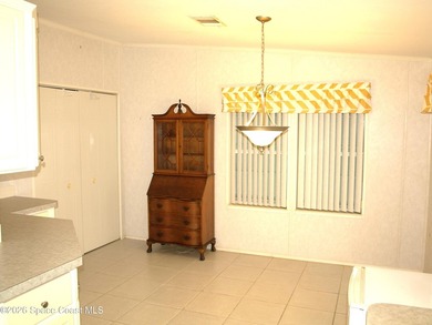 Brand New Roof To Be Installed On This 'Homes of Merit' Double on Barefoot Bay Golf Course in Florida - for sale on GolfHomes.com, golf home, golf lot