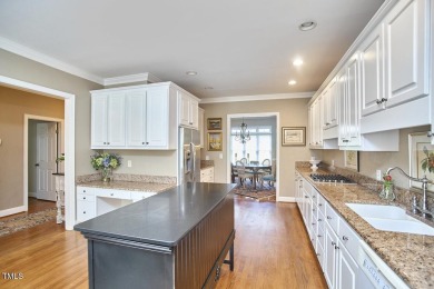 Stately all-brick end-unit townhome nestled in Westshore Park on Highland Country Club in North Carolina - for sale on GolfHomes.com, golf home, golf lot