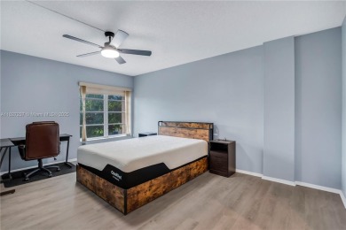 You're invited to this 2/2 corner unit with large windows on Inverrary Country Club in Florida - for sale on GolfHomes.com, golf home, golf lot