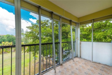 You're invited to this 2/2 corner unit with large windows on Inverrary Country Club in Florida - for sale on GolfHomes.com, golf home, golf lot