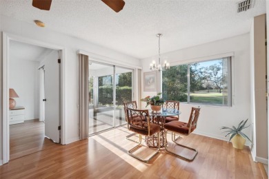 Welcome to your bright and cheerful haven in the heart of on Heather Golf and Country Club in Florida - for sale on GolfHomes.com, golf home, golf lot