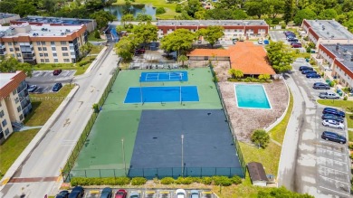 You're invited to this 2/2 corner unit with large windows on Inverrary Country Club in Florida - for sale on GolfHomes.com, golf home, golf lot