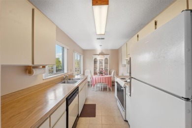 Welcome to your bright and cheerful haven in the heart of on Heather Golf and Country Club in Florida - for sale on GolfHomes.com, golf home, golf lot