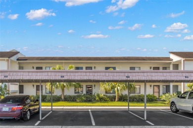 This second-floor, two-bedroom, two-bathroom condominium in East on East Lake Woodlands Country Club in Florida - for sale on GolfHomes.com, golf home, golf lot