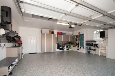 WOW... THIS MAGNIFICENT HOME IS READY FOR YOU TO WALK IN AND on Worthington Country Club in Florida - for sale on GolfHomes.com, golf home, golf lot