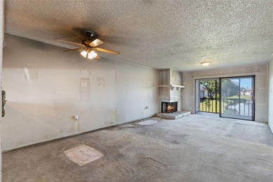 This second-floor, two-bedroom, two-bathroom condominium in East on East Lake Woodlands Country Club in Florida - for sale on GolfHomes.com, golf home, golf lot