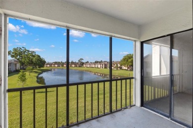 This second-floor, two-bedroom, two-bathroom condominium in East on East Lake Woodlands Country Club in Florida - for sale on GolfHomes.com, golf home, golf lot