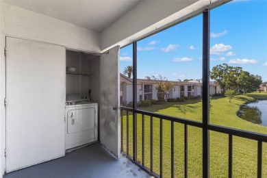 This second-floor, two-bedroom, two-bathroom condominium in East on East Lake Woodlands Country Club in Florida - for sale on GolfHomes.com, golf home, golf lot