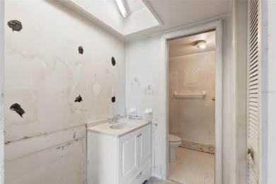 This second-floor, two-bedroom, two-bathroom condominium in East on East Lake Woodlands Country Club in Florida - for sale on GolfHomes.com, golf home, golf lot