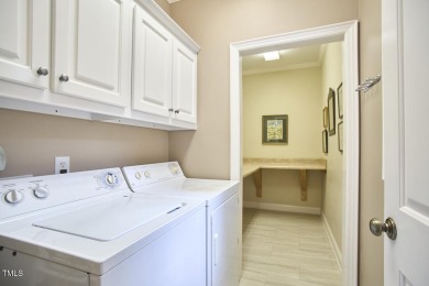 Stately all-brick end-unit townhome nestled in Westshore Park on Highland Country Club in North Carolina - for sale on GolfHomes.com, golf home, golf lot