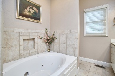 Stately all-brick end-unit townhome nestled in Westshore Park on Highland Country Club in North Carolina - for sale on GolfHomes.com, golf home, golf lot