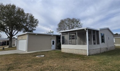 This 3-bedroom 2 bath home in Zellwood Station is located in the on Zellwood Station Country Club in Florida - for sale on GolfHomes.com, golf home, golf lot