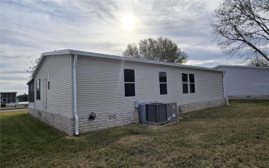 This 3-bedroom 2 bath home in Zellwood Station is located in the on Zellwood Station Country Club in Florida - for sale on GolfHomes.com, golf home, golf lot