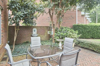 Stately all-brick end-unit townhome nestled in Westshore Park on Highland Country Club in North Carolina - for sale on GolfHomes.com, golf home, golf lot