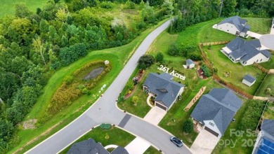 Maple Trace presents a fantastic opportunity! Nestled in a quiet on Reems Creek Golf Club in North Carolina - for sale on GolfHomes.com, golf home, golf lot