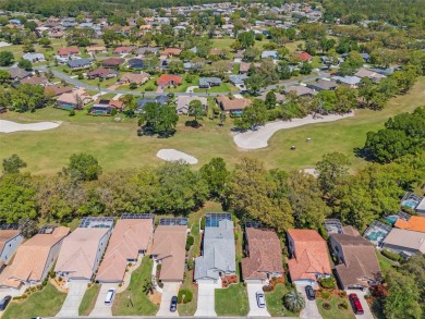 Welcome to your dream home in the sought-after GlenLakes Golf on Glen Lakes Country Club in Florida - for sale on GolfHomes.com, golf home, golf lot