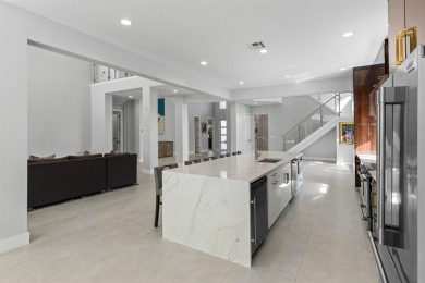 Step into this exquisitely renovated home, where modern design on Polo Club of Boca Raton in Florida - for sale on GolfHomes.com, golf home, golf lot