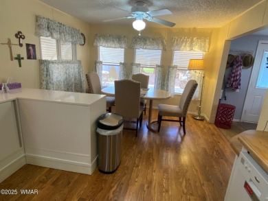 This cozy park model features 2 full bathrooms, a 40 gal hot on Juniper Ridge R.V. Golf Resort in Arizona - for sale on GolfHomes.com, golf home, golf lot