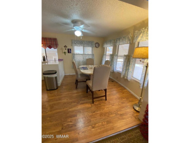 This cozy park model features 2 full bathrooms, a 40 gal hot on Juniper Ridge R.V. Golf Resort in Arizona - for sale on GolfHomes.com, golf home, golf lot