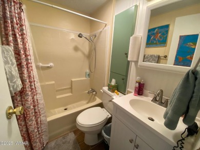 This cozy park model features 2 full bathrooms, a 40 gal hot on Juniper Ridge R.V. Golf Resort in Arizona - for sale on GolfHomes.com, golf home, golf lot